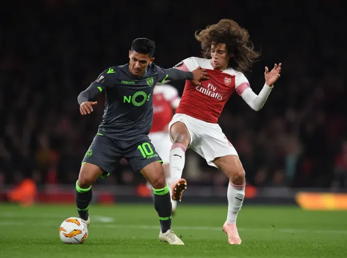 Framed Print : Arsenal vs. Sporting CP: Matteo Guendouzi vs. Fredy Montero - UEFA Europa League Clash Framed Print : Arsenal vs. Sporting CP: Matteo Guendouzi vs. Fredy Montero - UEFA Europa League Clash