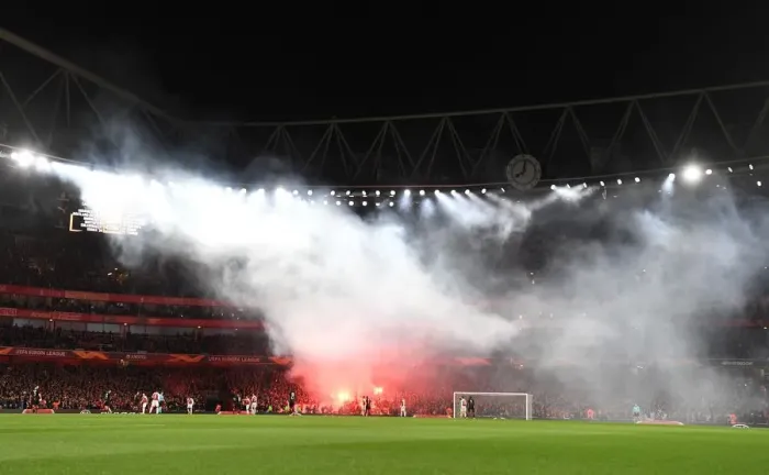 Framed Print : Arsenal vs. Stade Rennais: Europa League Clash Disrupted by Flares in Intense Atmosphere