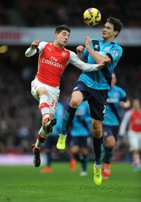 Framed Print : Arsenal vs Stoke City: Hector Bellerin vs Philipp Wollscheid - Intense Battle at Emirates Stadium, Premier League 2014-15