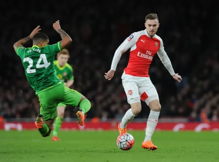 Framed Print : Arsenal vs. Sunderland: FA Cup Showdown - Ramsey vs. Yedlin's Intense Battle Framed Print : Arsenal vs. Sunderland: FA Cup Showdown - Ramsey vs. Yedlin's Intense Battle