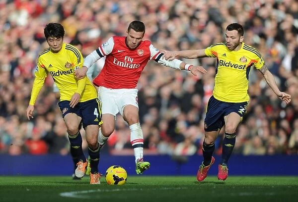 Arsenal vs. Sunderland: Lukas Podolski Faces Off Against Ki Sung-Yueng and Phil Bardsley