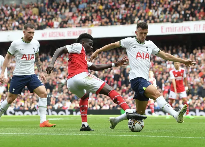 Framed Print : Arsenal vs. Tottenham: Bukayo Saka Faces Off Against Ivan Perisic in the 2022-23 Premier League Clash at Emirates Stadium Framed Print : Arsenal vs. Tottenham: Bukayo Saka Faces Off Against Ivan Perisic in the 2022-23 Premier League Clash at Emirates Stadium