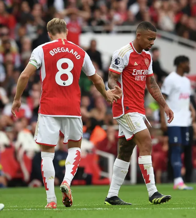 Framed Print : Arsenal vs. Tottenham: Martin Odegaard and Gabriel Jesus Exchange Handshakes in 2023-24 Premier League Clash