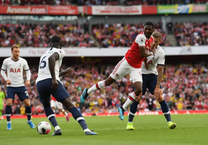 Framed Print : Arsenal vs. Tottenham: A Battle of Wits - Maitland-Niles vs. Alderweireld, Premier League Showdown at Emirates Stadium (2019-20)