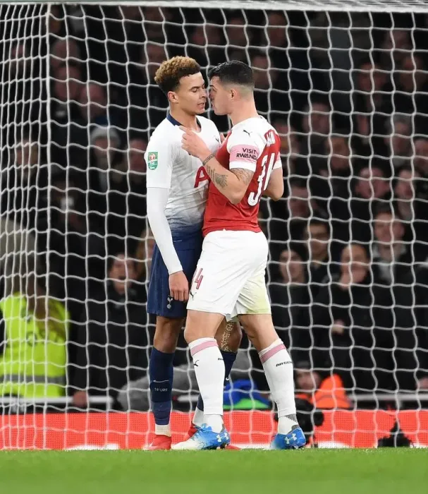 Framed Print : Arsenal vs. Tottenham: Carabao Cup Clash - Xhaka vs. Alli's Intense Battle Framed Print : Arsenal vs. Tottenham: Carabao Cup Clash - Xhaka vs. Alli's Intense Battle