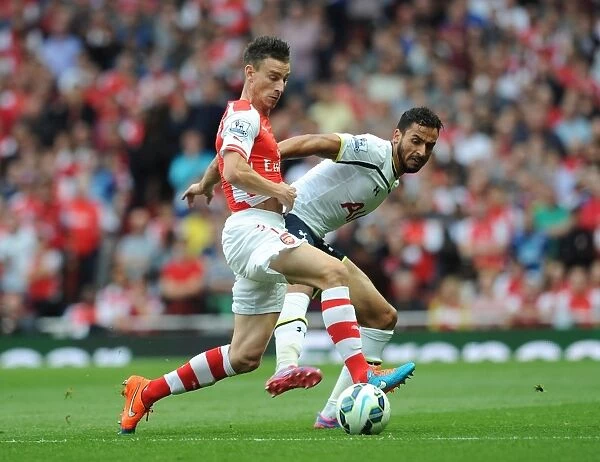 Arsenal vs. Tottenham: Koscielny Tackles Chadli in Intense Premier League Clash
