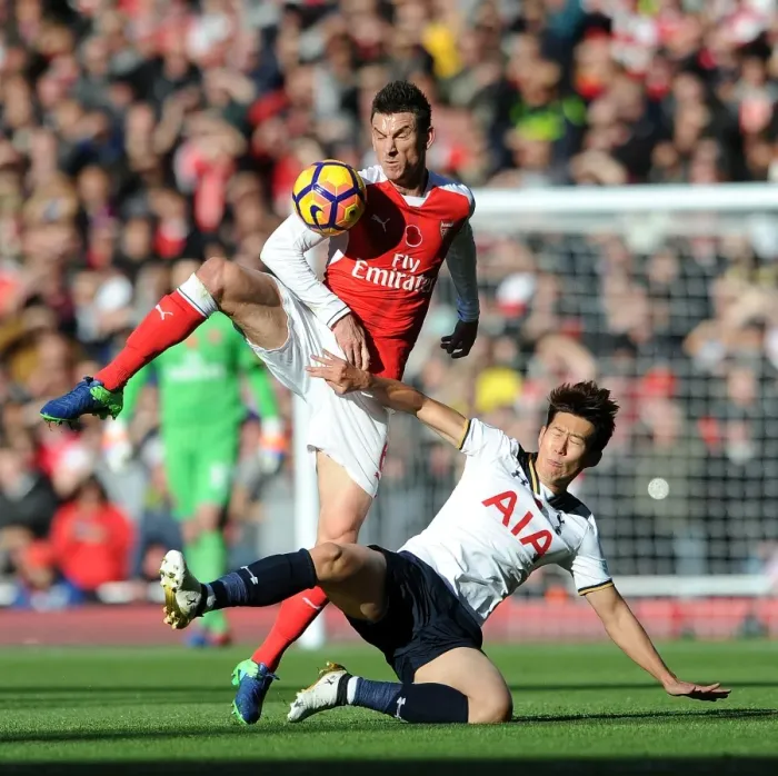 Framed Print : Arsenal vs. Tottenham: Koscielny vs. Son - A Premier League Rivalry: The Battle at Emirates Stadium (2016-17)