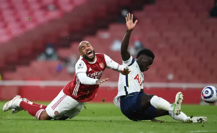 Framed Print : Arsenal vs. Tottenham: Lacazette Reacts to Penalty Call in Intense Premier League Clash Framed Print : Arsenal vs. Tottenham: Lacazette Reacts to Penalty Call in Intense Premier League Clash