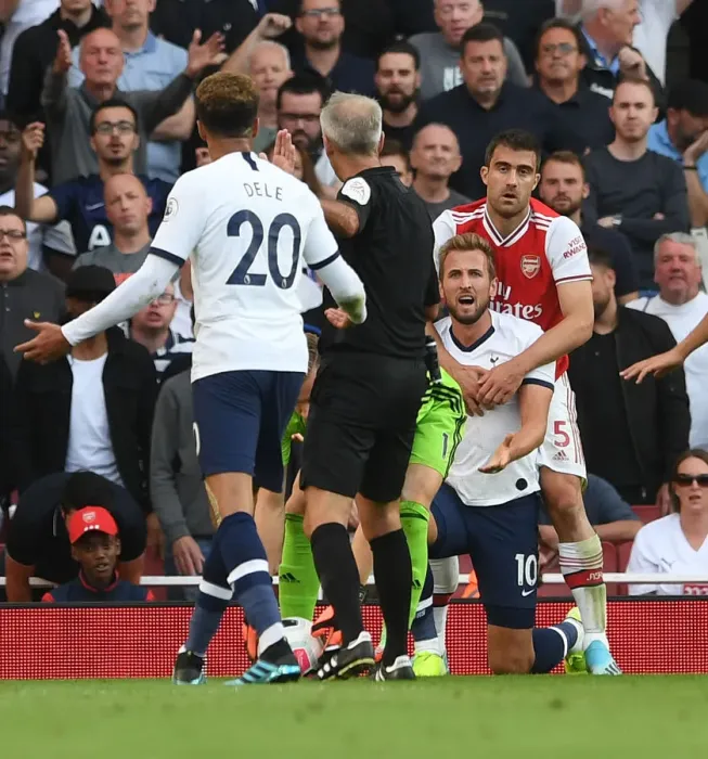 Framed Print : Arsenal vs. Tottenham: A Moment of Sportsmanship Amidst Rivalry (2019-20)