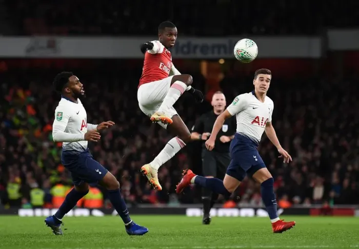 Framed Print : Arsenal vs. Tottenham: Nketiah's Heading Battle against Rose and Winks - Carabao Cup Quarterfinals