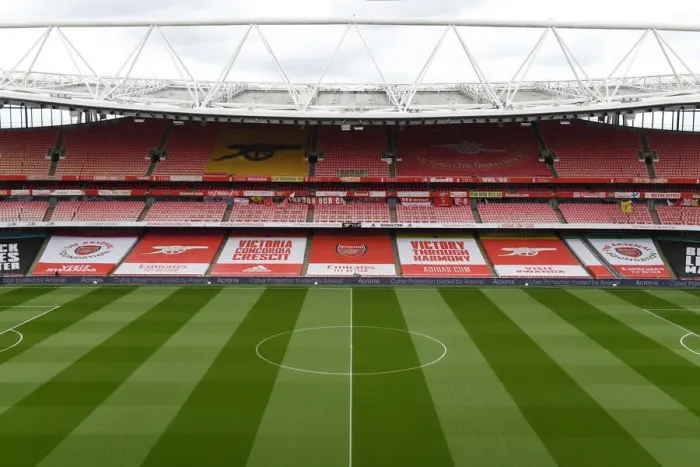 Framed Print : Arsenal vs. Tottenham: A Pandemic-hit Showdown at Empty Emirates Stadium