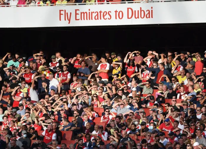 Framed Print : Arsenal vs. Tottenham: The Passionate Battle in the 2021-22 Premier League - A Sea of Arsenal Fans at Emirates Stadium