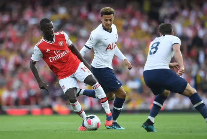 Framed Print : Arsenal vs. Tottenham: Pepe Clashes with Alli and Winks in the 2019-20 Premier League Battle at Emirates Stadium
