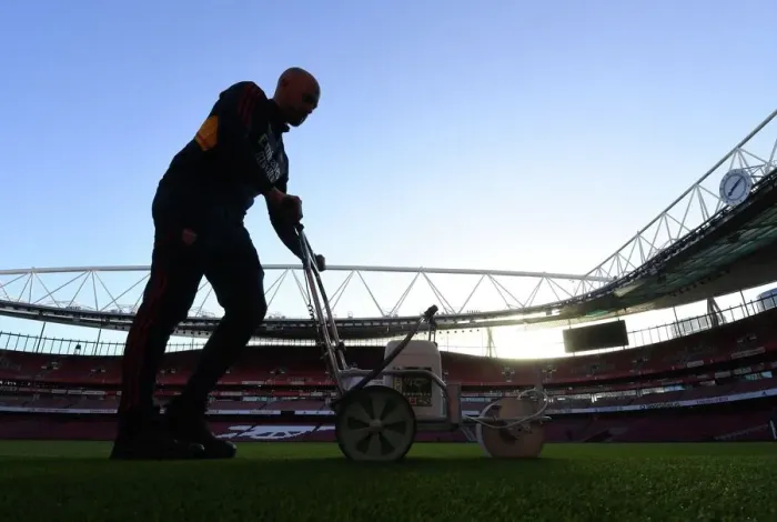 Framed Print : Arsenal vs. Tottenham: Pre-Match Pitch Preparation at Emirates Stadium (2022-23)