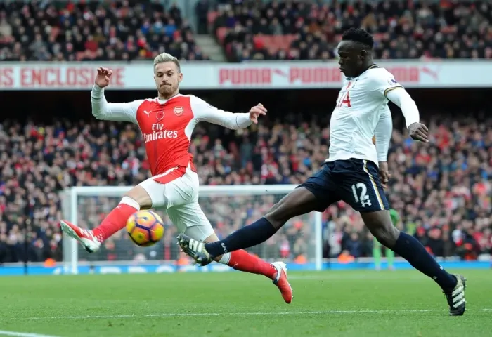 Framed Print : Arsenal vs. Tottenham: Ramsey Closes In on Wanyama in Intense Premier League Clash