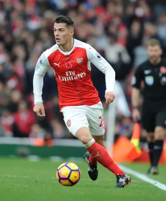Framed Print : Arsenal vs. Tottenham Showdown: Xhaka's Battle in the 2016-17 Premier League - Arsenal's Midfield Maestro Faces Off Against Spurs at Emirates Stadium Framed Print : Arsenal vs. Tottenham Showdown: Xhaka's Battle in the 2016-17 Premier League - Arsenal's Midfield Maestro Faces Off Against Spurs at Emirates Stadium