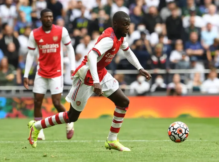 Framed Print : Arsenal vs. Tottenham Showdown: Nicolas Pepe's Mind-Bending Performance at Tottenham Stadium