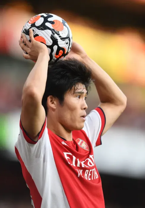 Framed Print : Arsenal vs. Tottenham Showdown: Tomiyasu in Action at the Emirates Stadium