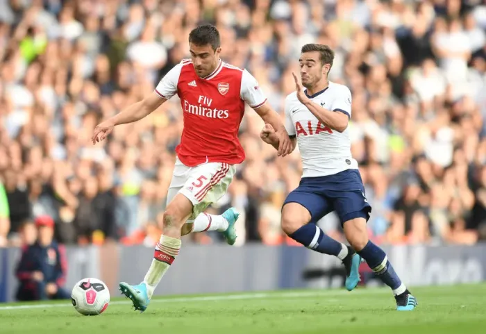 Framed Print : Arsenal vs. Tottenham: Sokratis Clashes with Winks in the Premier League Showdown at Emirates Stadium Framed Print : Arsenal vs. Tottenham: Sokratis Clashes with Winks in the Premier League Showdown at Emirates Stadium