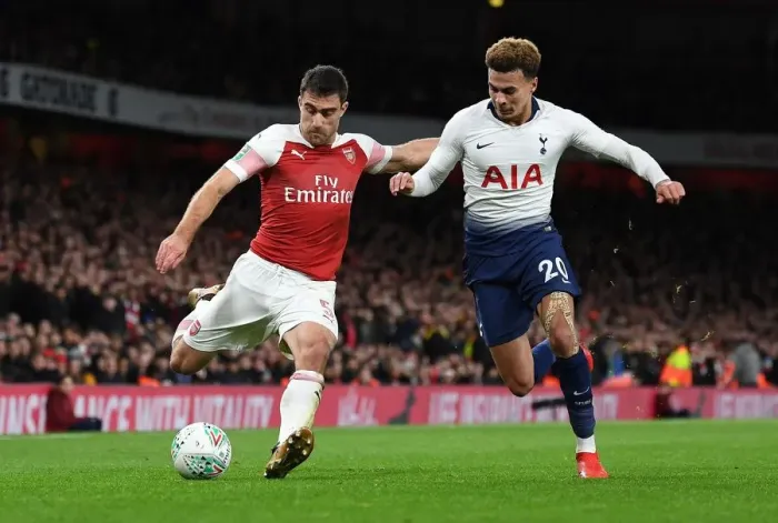 Framed Print : Arsenal vs. Tottenham: Sokratis Faces Off Against Dele Alli in Carabao Cup Quarterfinal Showdown Framed Print : Arsenal vs. Tottenham: Sokratis Faces Off Against Dele Alli in Carabao Cup Quarterfinal Showdown