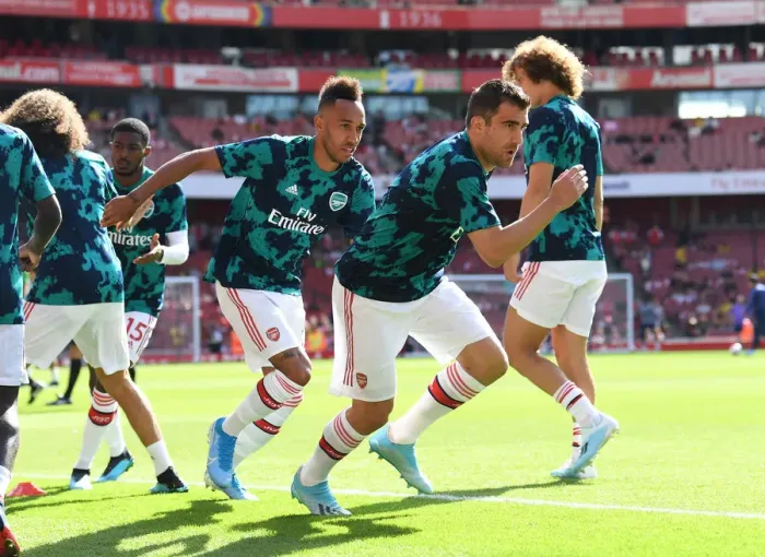 Framed Print : Arsenal vs. Tottenham: Sokratis Warming Up Ahead of Premier League Clash at Emirates Stadium
