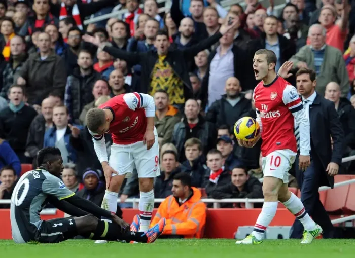 Framed Print : Arsenal vs. Tottenham: Wilshere and Adebayor Clash in the 2012-13 Premier League