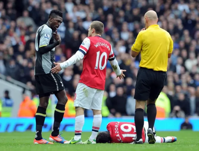 Framed Print : Arsenal vs. Tottenham: Wilshere-Adebayor Rivalry Reignites in Contentious Cazorla Foul Framed Print : Arsenal vs. Tottenham: Wilshere-Adebayor Rivalry Reignites in Contentious Cazorla Foul