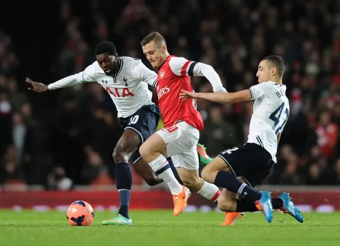 Framed Print : Arsenal vs. Tottenham: Wilshere Clashes with Adebayor and Bentaleb in FA Cup Third Round