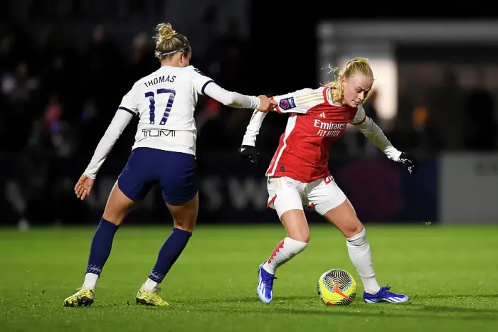 Framed Print : Arsenal vs. Tottenham Women's Clash: A Star-Studded Battle between Kuehl and Thomas in the FA WSL Cup