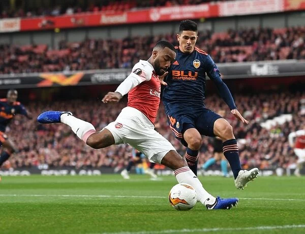 Arsenal vs Valencia: Alex Lacazette Faces Off Against Facundo Roncaglia in the 2018-19 Europa League Semi-Final First Leg