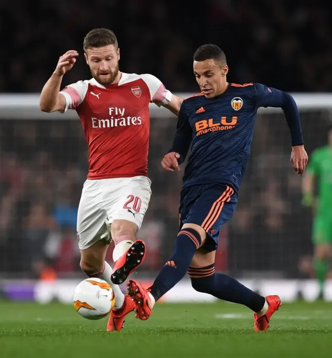 Framed Print : Arsenal vs Valencia: Mustafi Closes In on Rodrigo in Europa League Semi-Final Showdown Framed Print : Arsenal vs Valencia: Mustafi Closes In on Rodrigo in Europa League Semi-Final Showdown
