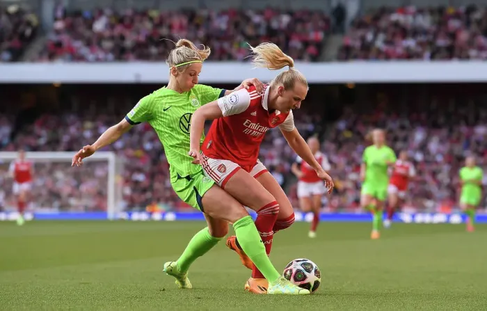 Framed Print : Arsenal vs. VfL Wolfsburg: A Battle for Possession in the UEFA Women's Champions League Semifinal