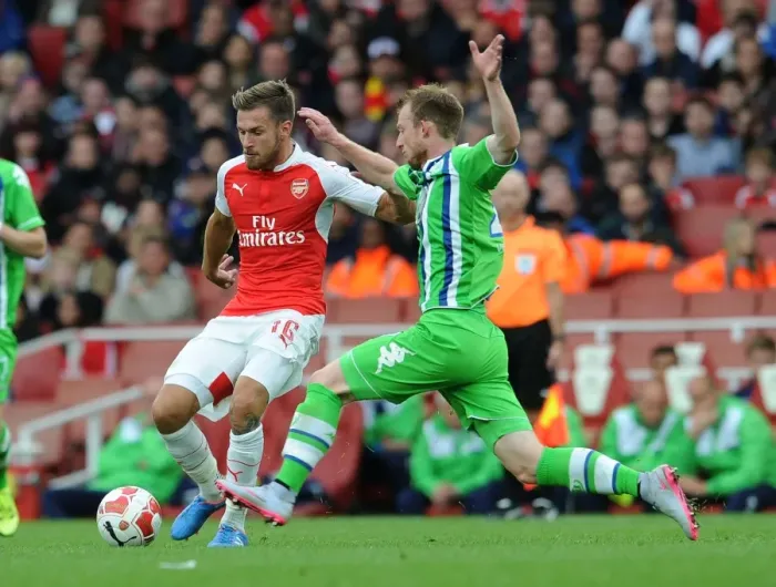 Framed Print : Arsenal vs. VfL Wolfsburg: A Tense Emirates Cup Showdown, 2015