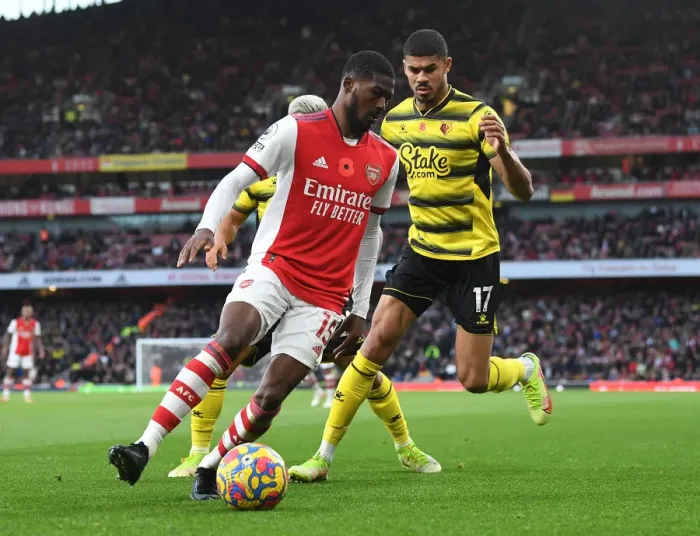 Framed Print : Arsenal vs. Watford: Ainsley Maitland-Niles Holds Off Ashley Fletcher in Premier League Clash Framed Print : Arsenal vs. Watford: Ainsley Maitland-Niles Holds Off Ashley Fletcher in Premier League Clash