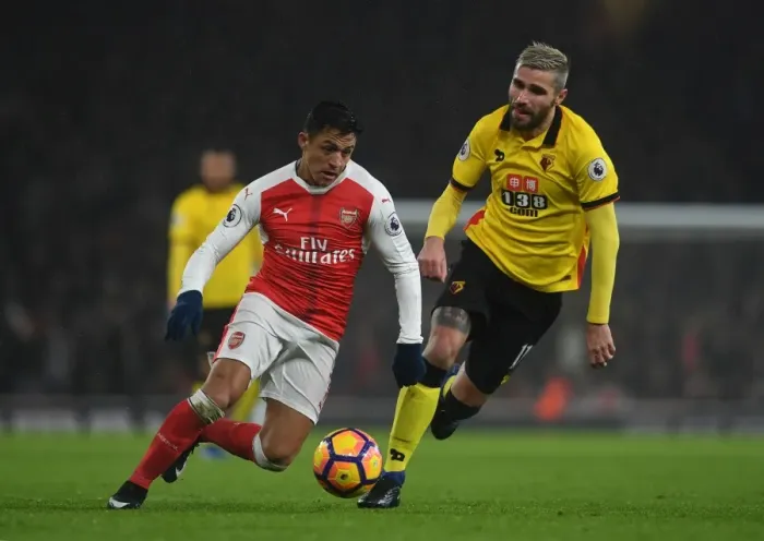 Framed Print : Arsenal vs. Watford: Alexis Sanchez Faces Off Against Valon Behrami in Premier League Clash