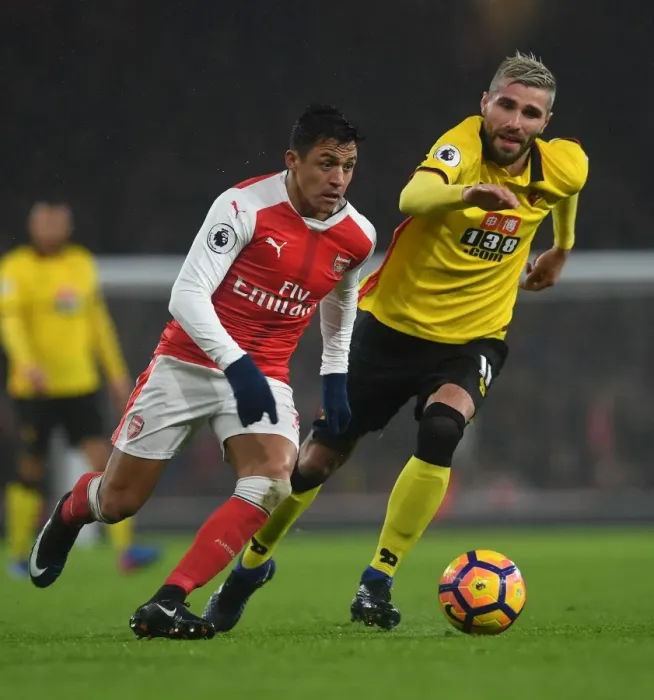 Framed Print : Arsenal vs. Watford: A Fierce Battle – Sanchez vs. Behrami