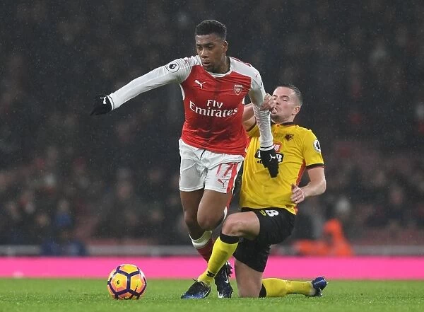 Arsenal vs. Watford: Intense Clash Between Iwobi and Cleverley in Premier League Match