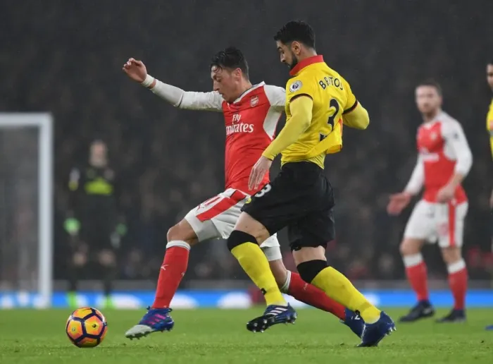 Framed Print : Arsenal vs Watford: Ozil Faces Off Against Britos in Intense Premier League Clash Framed Print : Arsenal vs Watford: Ozil Faces Off Against Britos in Intense Premier League Clash