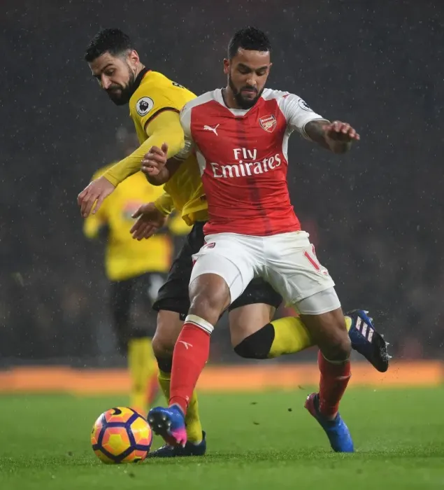 Framed Print : Arsenal vs. Watford: Theo Walcott Faces Off Against Miguel Britos Framed Print : Arsenal vs. Watford: Theo Walcott Faces Off Against Miguel Britos