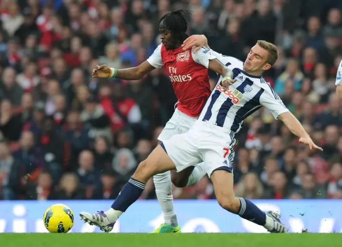 Framed Print : Arsenal vs. West Bromwich Albion: Gervinho vs. James Morrison Tangle in Premier League Clash Framed Print : Arsenal vs. West Bromwich Albion: Gervinho vs. James Morrison Tangle in Premier League Clash