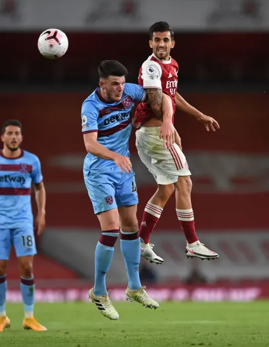 Framed Print : Arsenal vs. West Ham: Ceballos Faces Off Against Rice in Intense Premier League Clash