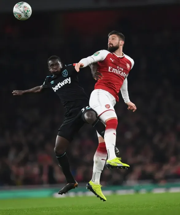 Framed Print : Arsenal vs. West Ham: Giroud vs. Quina Clash in Carabao Cup Quarterfinal
