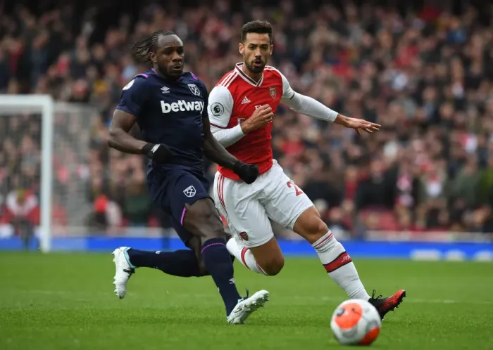 Framed Print : Arsenal vs. West Ham: Pablo Mari Closes In on Michail Antonio in Intense Premier League Clash Framed Print : Arsenal vs. West Ham: Pablo Mari Closes In on Michail Antonio in Intense Premier League Clash