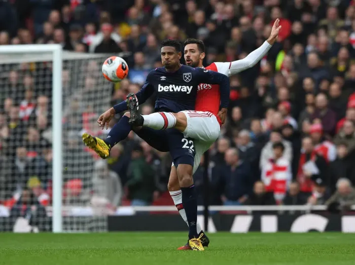 Framed Print : Arsenal vs. West Ham: Pablo Mari Faces Off Against Sebastien Haller in Premier League Clash Framed Print : Arsenal vs. West Ham: Pablo Mari Faces Off Against Sebastien Haller in Premier League Clash