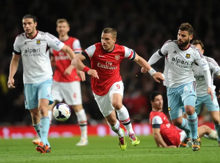 Framed Print : Arsenal vs. West Ham: Podolski Clashes with Nocerino and Carroll Framed Print : Arsenal vs. West Ham: Podolski Clashes with Nocerino and Carroll