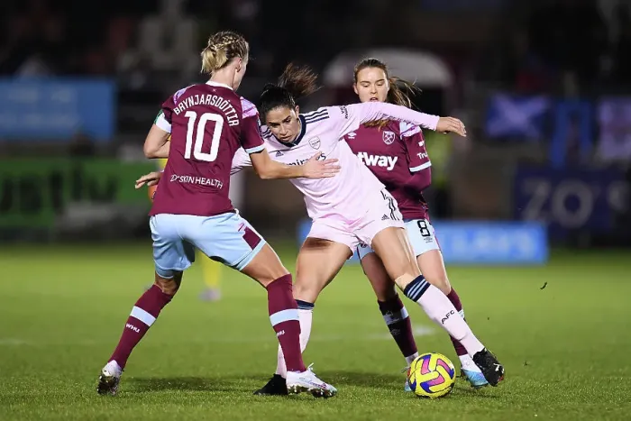 Framed Print : Arsenal vs. West Ham United: A Battle for Possession in the Barclays Women's Super League