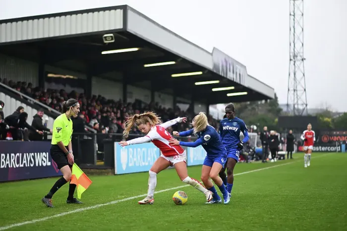 Framed Print : Arsenal vs. West Ham United: A Battle for Possession in the Barclays Women's Super League Framed Print : Arsenal vs. West Ham United: A Battle for Possession in the Barclays Women's Super League