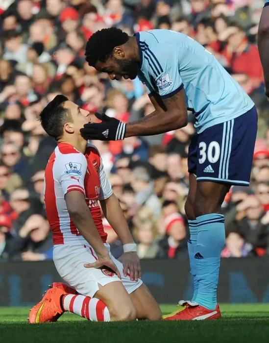 Framed Print : Arsenal vs. West Ham United: Clash Between Sanchez and Song in the Premier League
