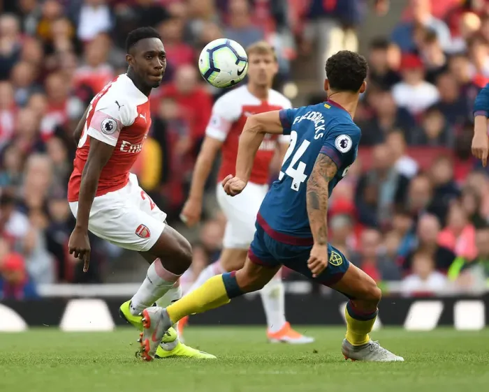 Framed Print : Arsenal vs. West Ham: Welbeck vs. Fredericks in Premier League Clash Framed Print : Arsenal vs. West Ham: Welbeck vs. Fredericks in Premier League Clash