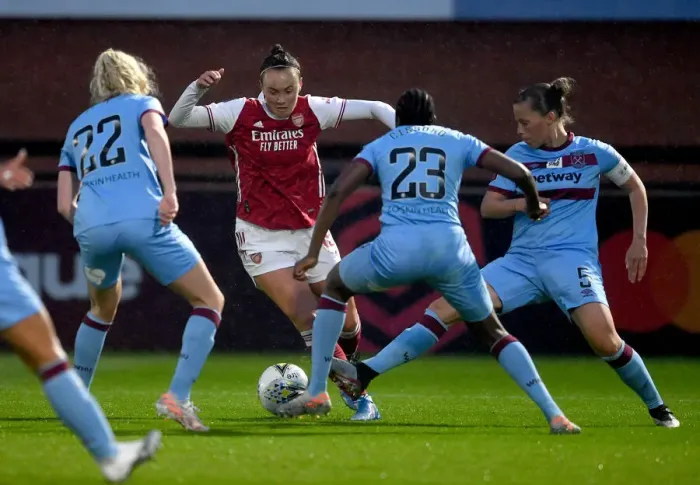 Framed Print : Arsenal vs. West Ham Women: FA WSL Clash Amidst Empty Stands (April 2021) Framed Print : Arsenal vs. West Ham Women: FA WSL Clash Amidst Empty Stands (April 2021)